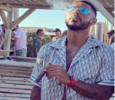 Andre Gray smoking